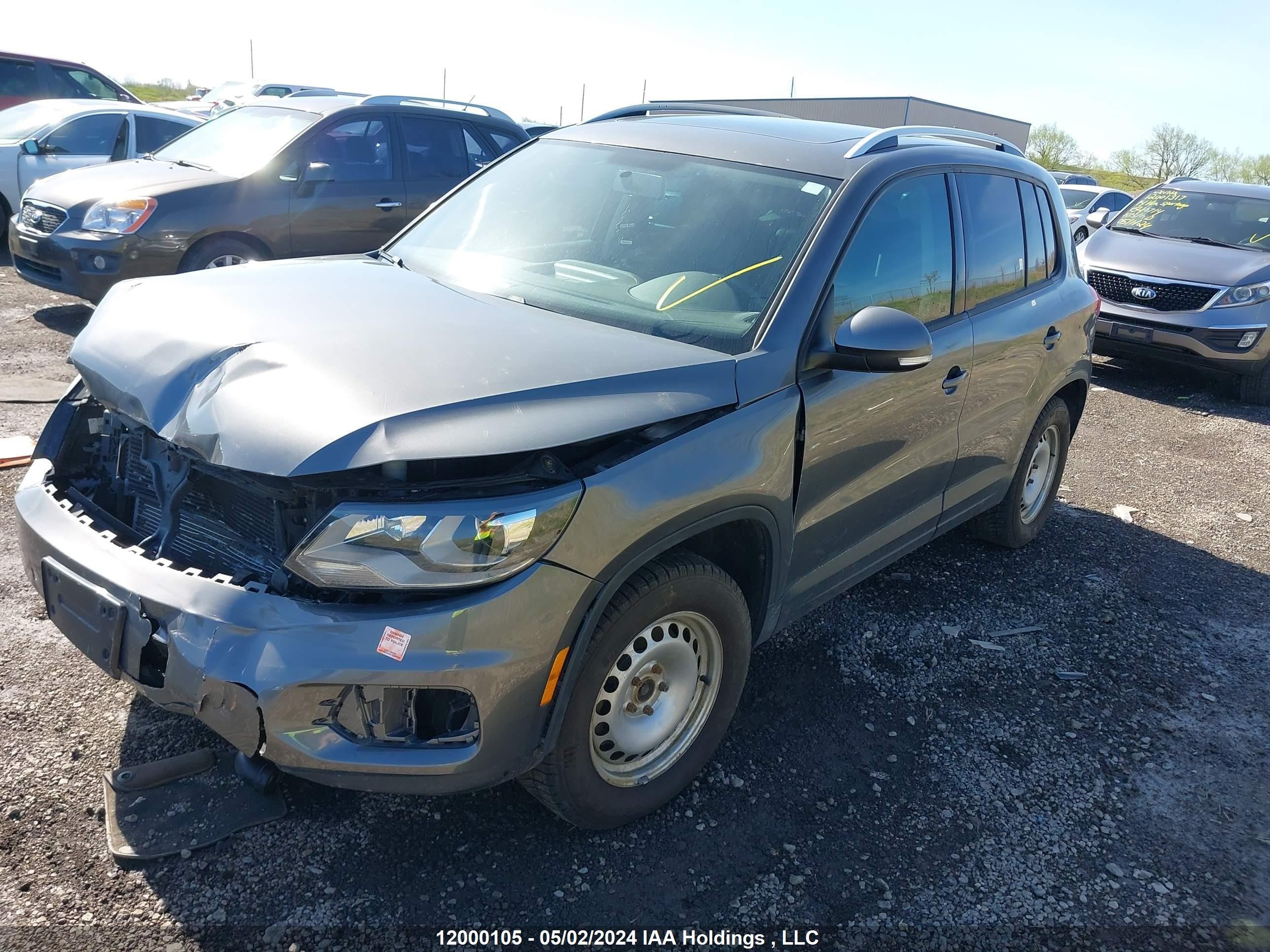 Photo 1 VIN: WVGJV3AX4EW514873 - VOLKSWAGEN TIGUAN 