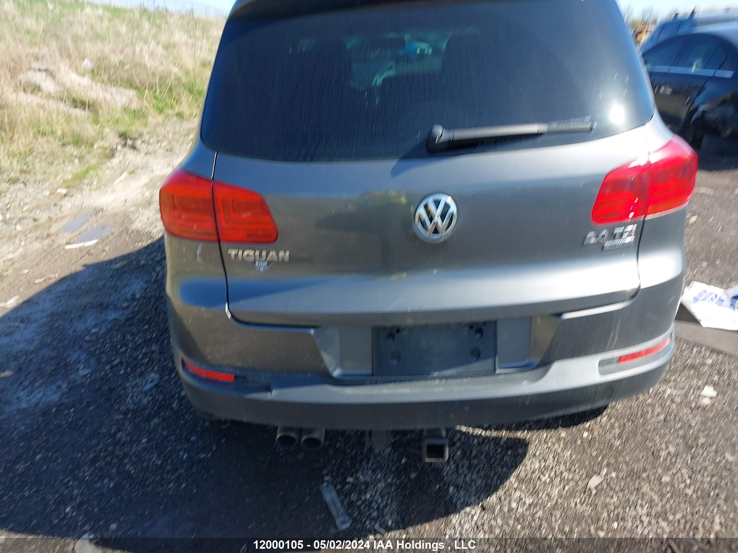 Photo 16 VIN: WVGJV3AX4EW514873 - VOLKSWAGEN TIGUAN 