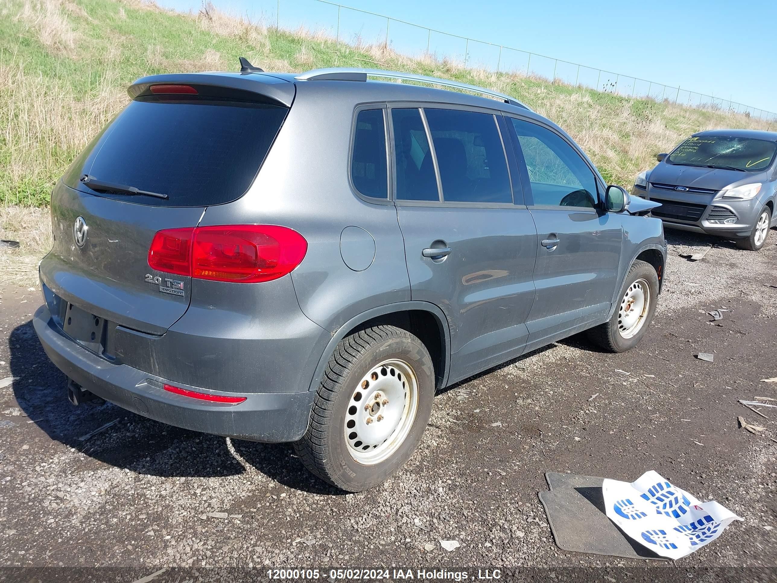 Photo 3 VIN: WVGJV3AX4EW514873 - VOLKSWAGEN TIGUAN 