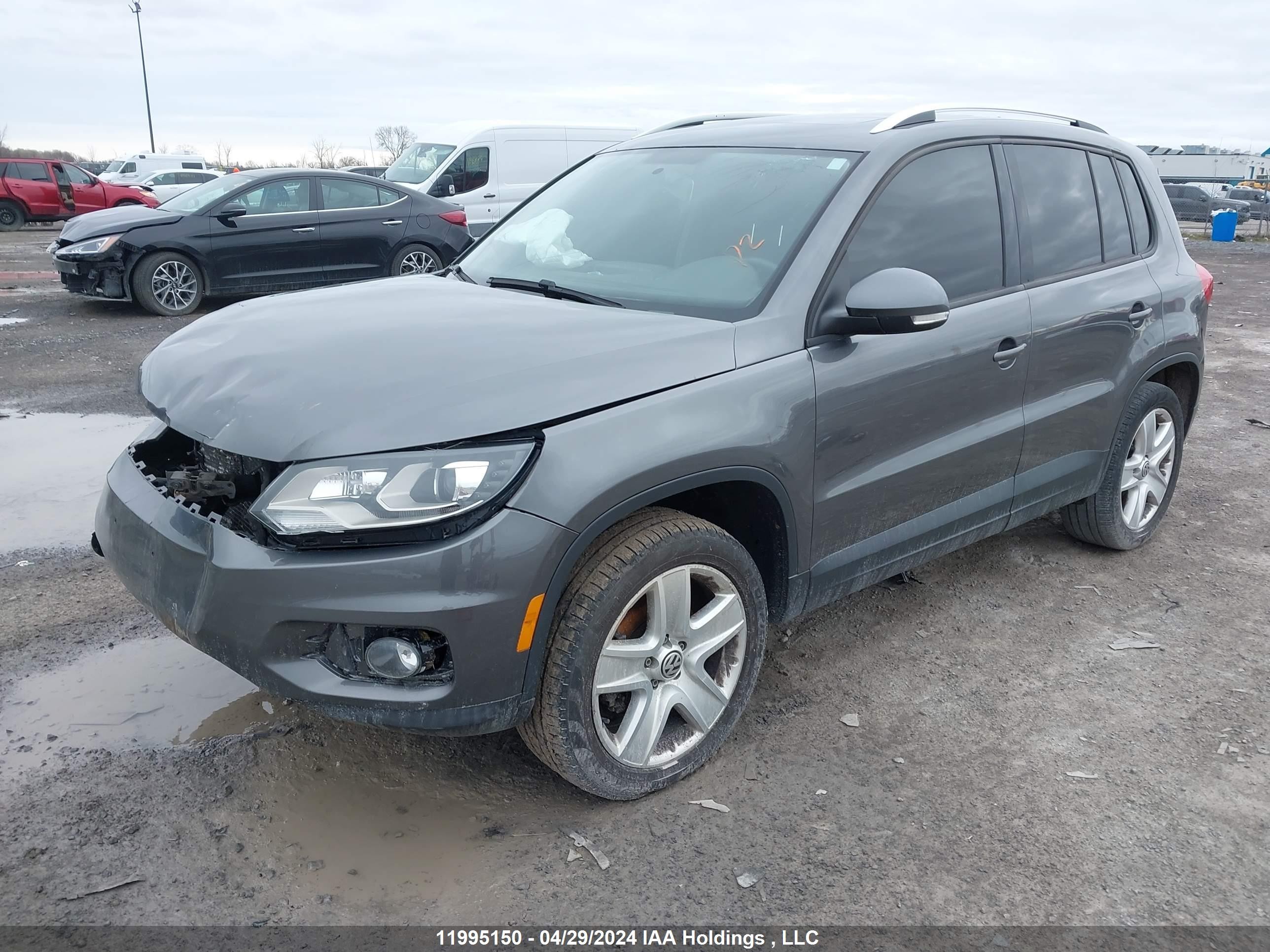 Photo 1 VIN: WVGJV3AX5EW534274 - VOLKSWAGEN TIGUAN 