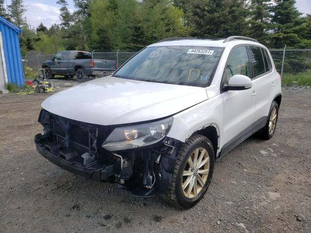 Photo 1 VIN: WVGJV3AX8EW522670 - VOLKSWAGEN TIGUAN 