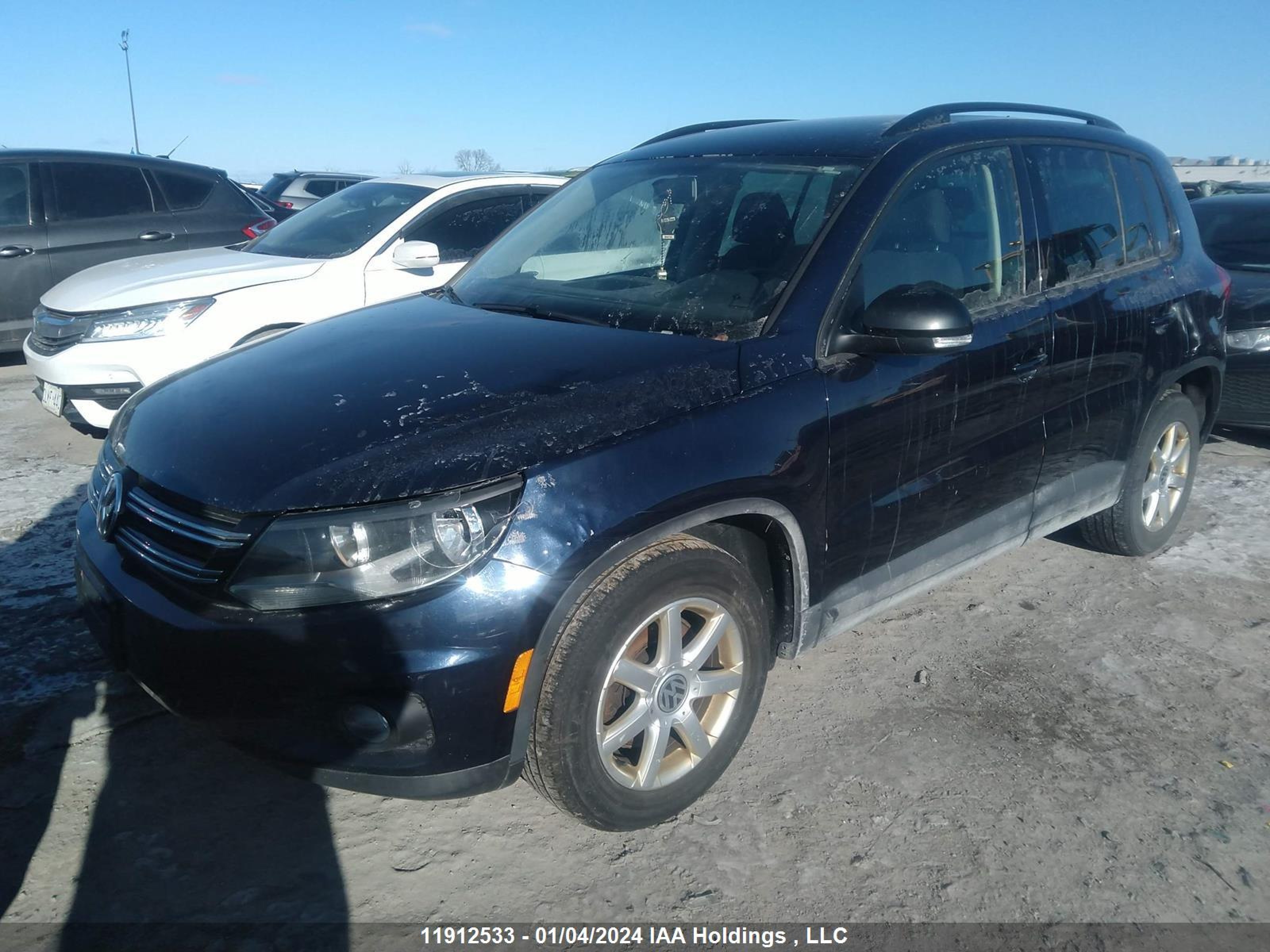 Photo 1 VIN: WVGJV3AX8EW564384 - VOLKSWAGEN TIGUAN 