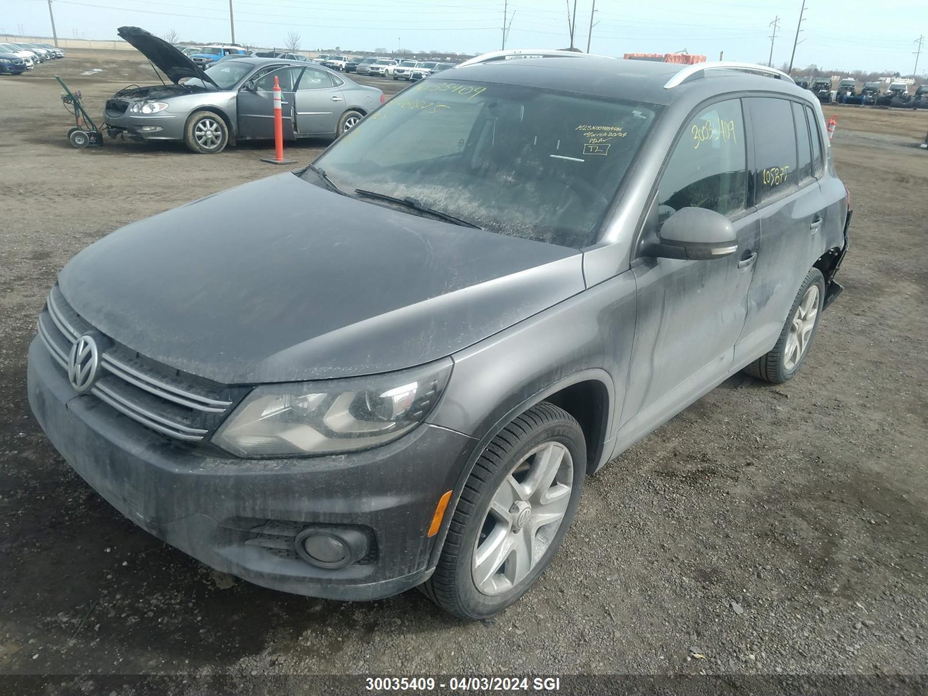 Photo 1 VIN: WVGJV3AX9EW578875 - VOLKSWAGEN TIGUAN 