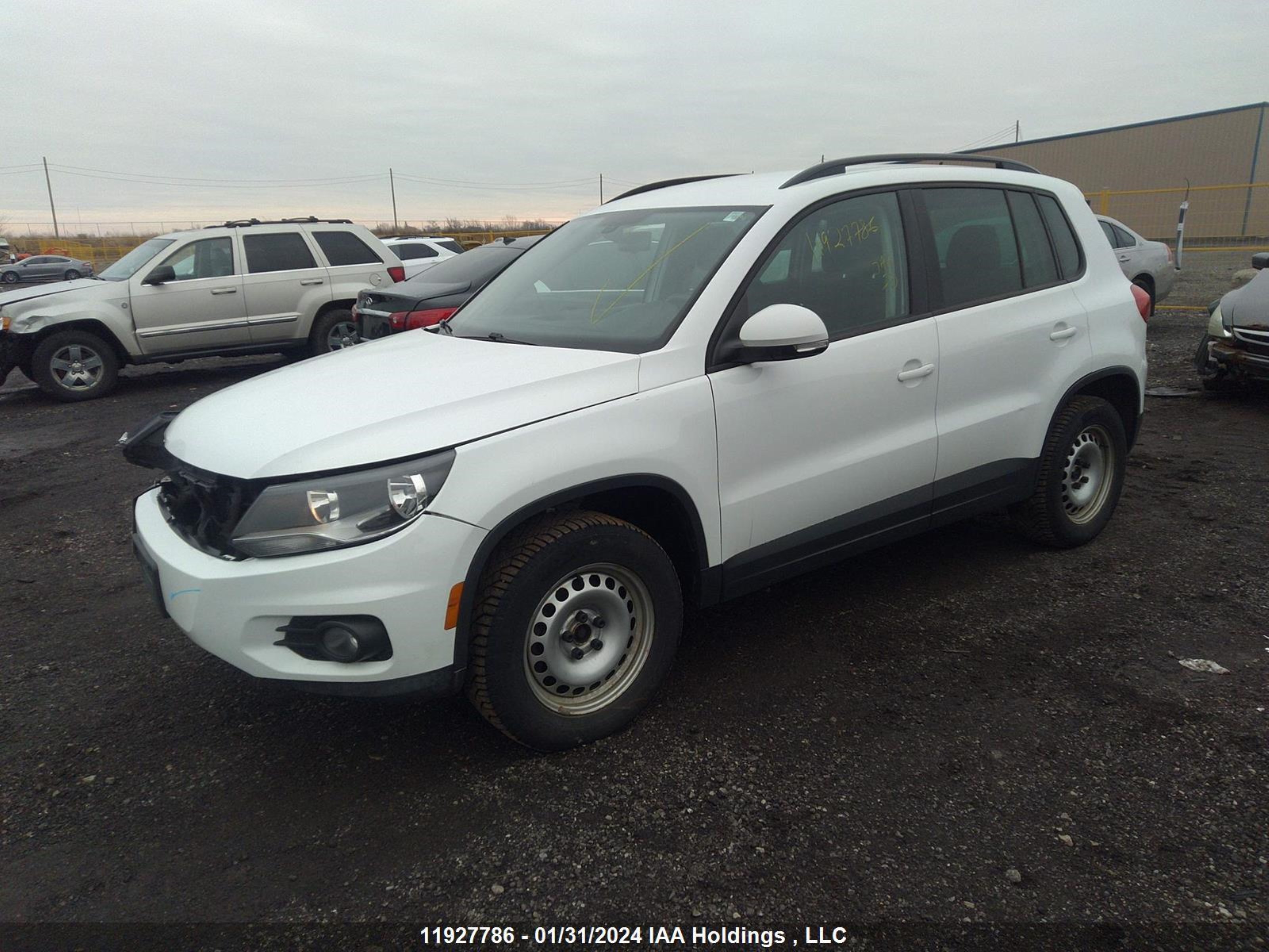 Photo 1 VIN: WVGJV7AX2GW530595 - VOLKSWAGEN TIGUAN 