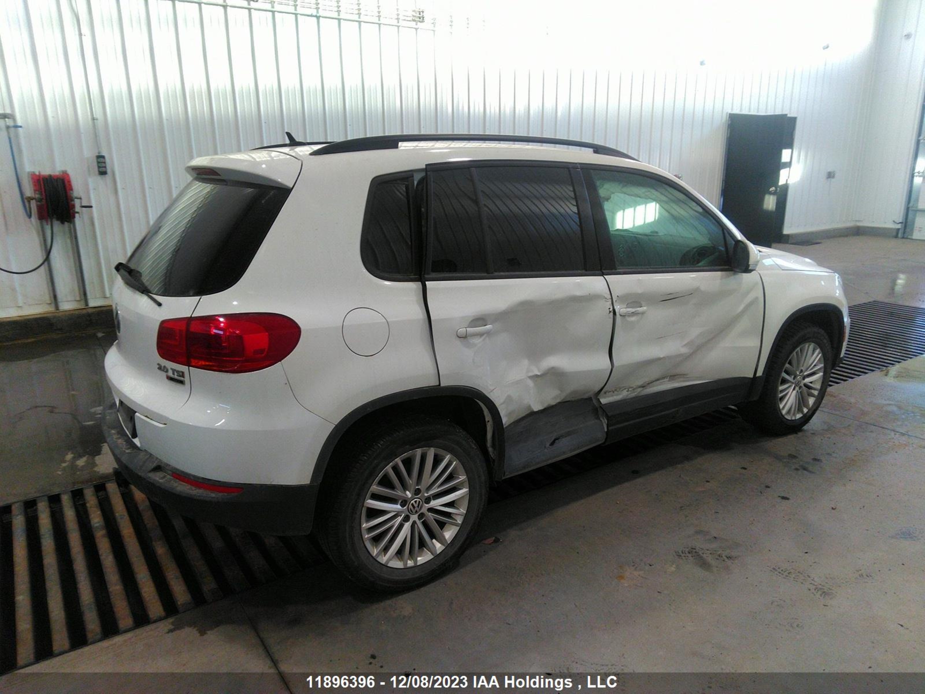 Photo 3 VIN: WVGJV7AX6GW097346 - VOLKSWAGEN TIGUAN 