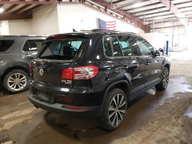 Photo 2 VIN: WVGJV7AX8GW555985 - VOLKSWAGEN TIGUAN COM 