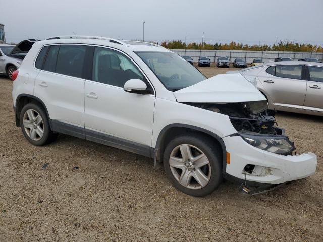 Photo 3 VIN: WVGJV7AX8GW576710 - VOLKSWAGEN TIGUAN COM 