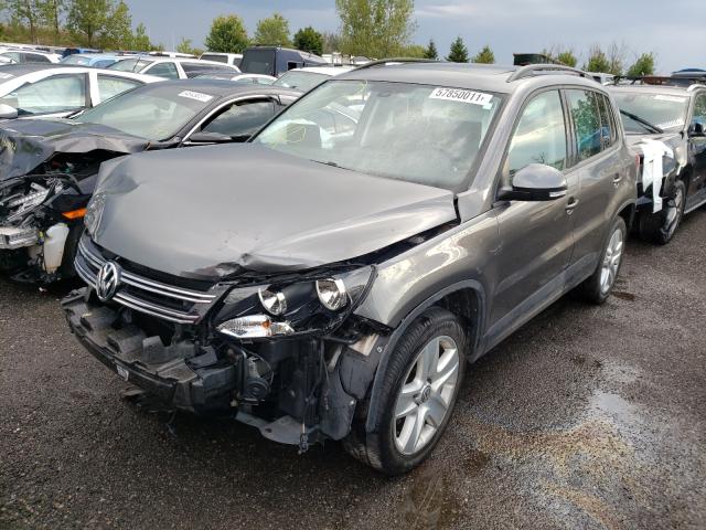 Photo 1 VIN: WVGJV7AX8GW584693 - VOLKSWAGEN TIGUAN COM 