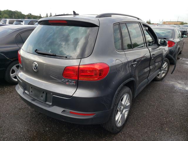 Photo 3 VIN: WVGJV7AX8GW584693 - VOLKSWAGEN TIGUAN COM 