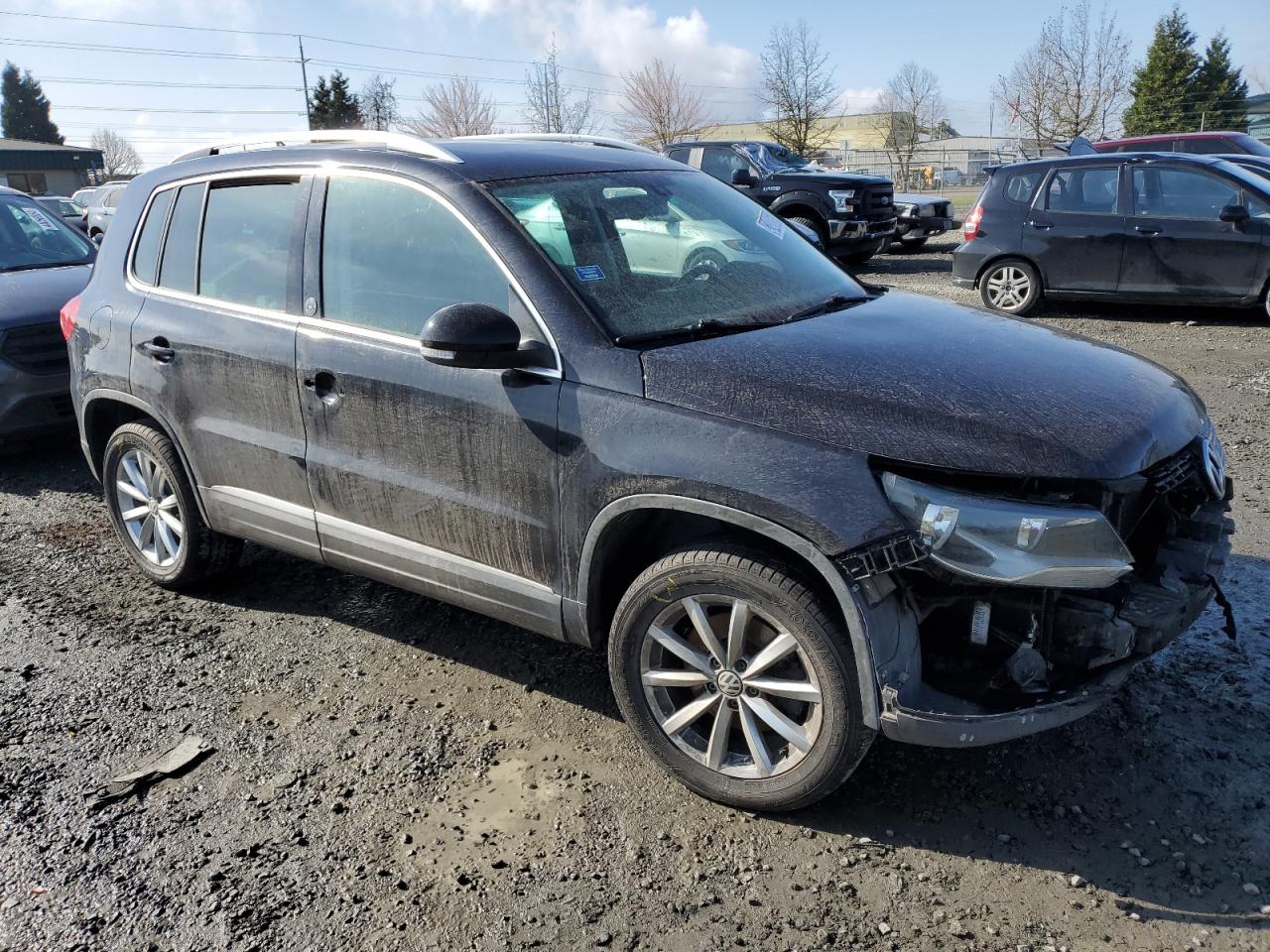 Photo 3 VIN: WVGRV7AX9HK002788 - VOLKSWAGEN TIGUAN 