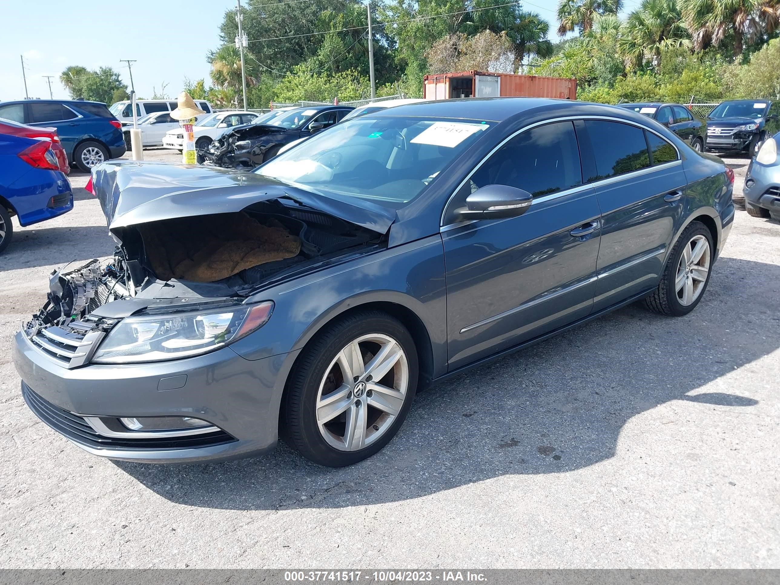 Photo 1 VIN: WVWBP7AN9EE520568 - VOLKSWAGEN PASSAT 