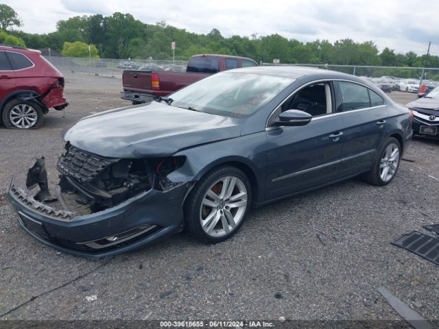 Photo 1 VIN: WVWRP7AN9DE534435 - VOLKSWAGEN PASSAT 