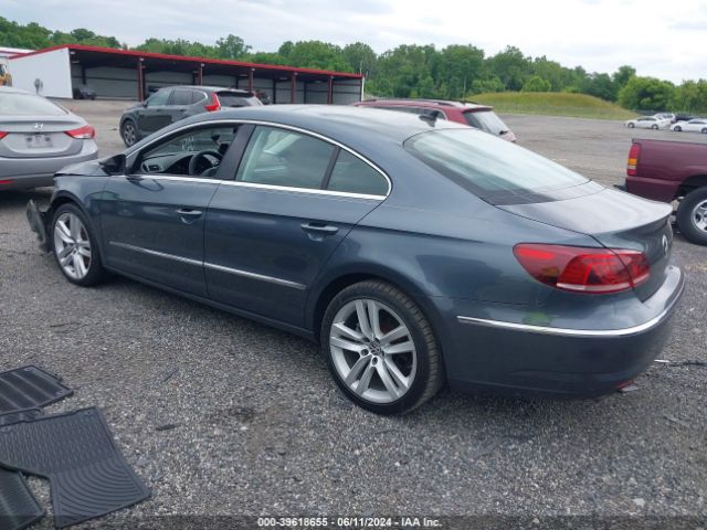 Photo 2 VIN: WVWRP7AN9DE534435 - VOLKSWAGEN PASSAT 