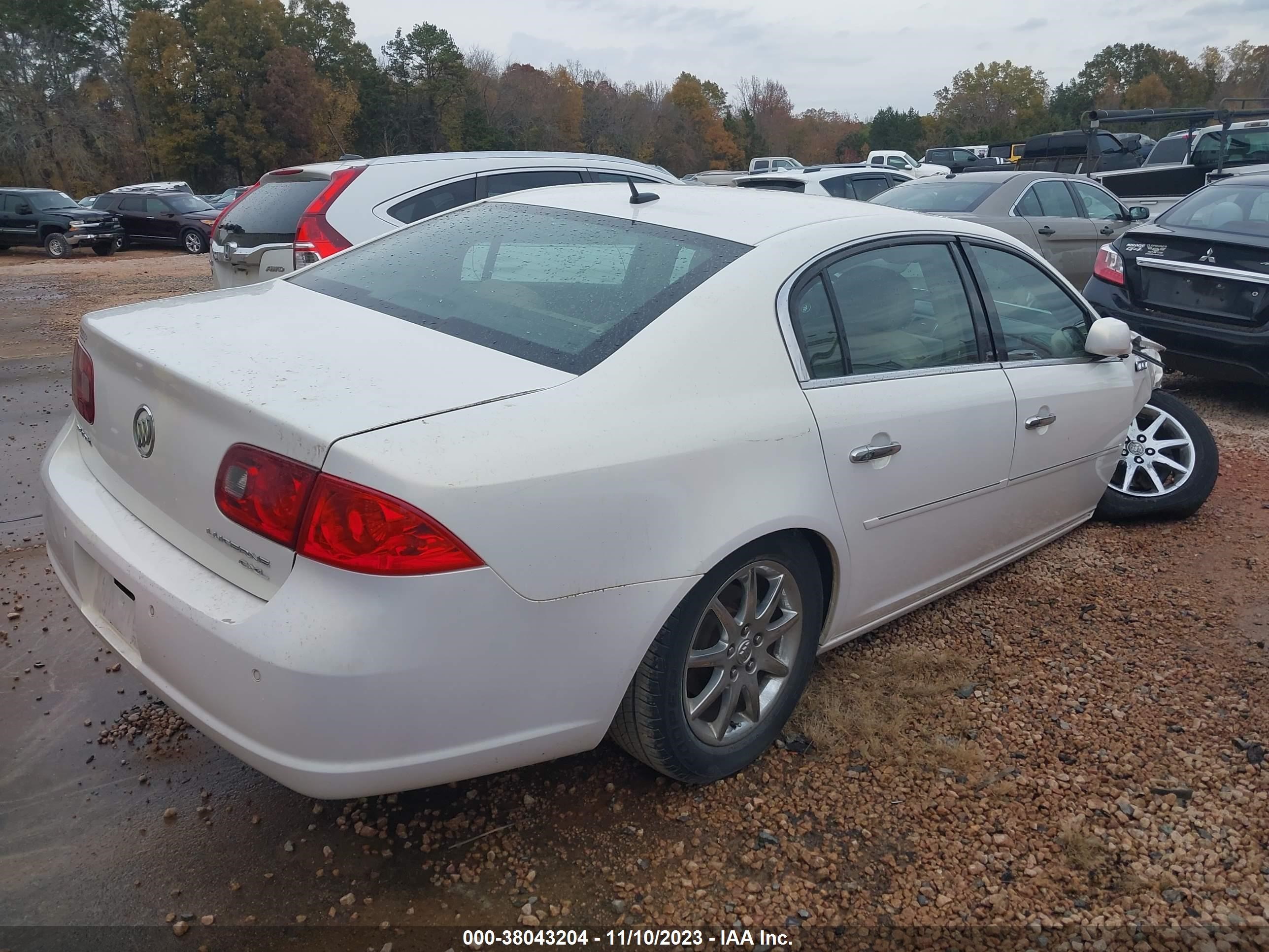 Photo 3 VIN: WVWZZZ3CZ9E512164 - BUICK LUCERNE 